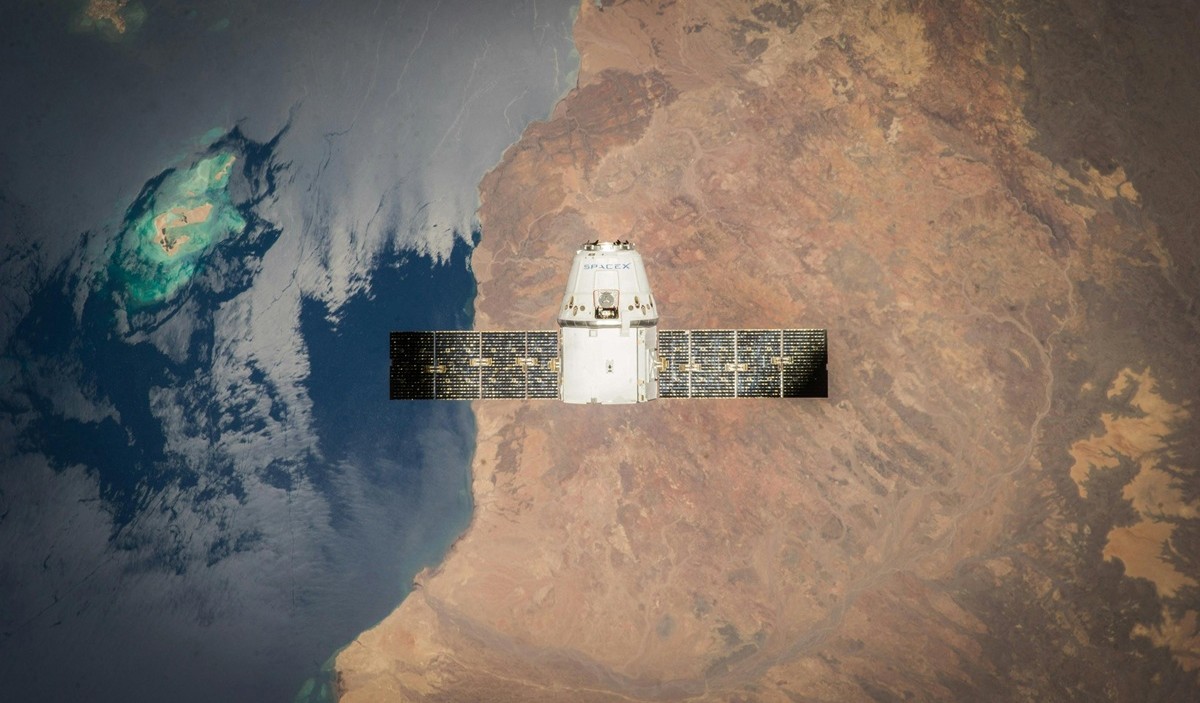 Satellite in orbit observing Earth for geospatial energy intelligence