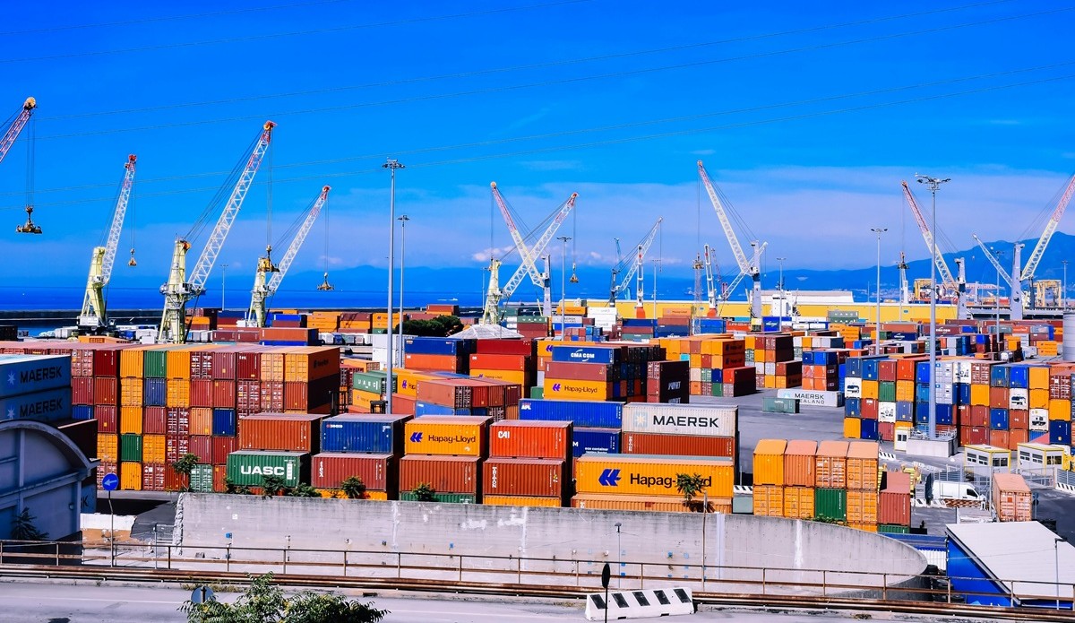 Container terminal with cranes and shipping containers ready for logistics handling