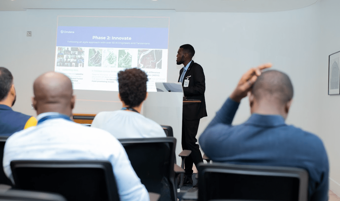 a man writing code on an IDE